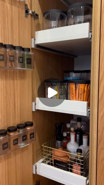 Historical Instagram video thumbnail: open pantry cabinet with spices stored on the door